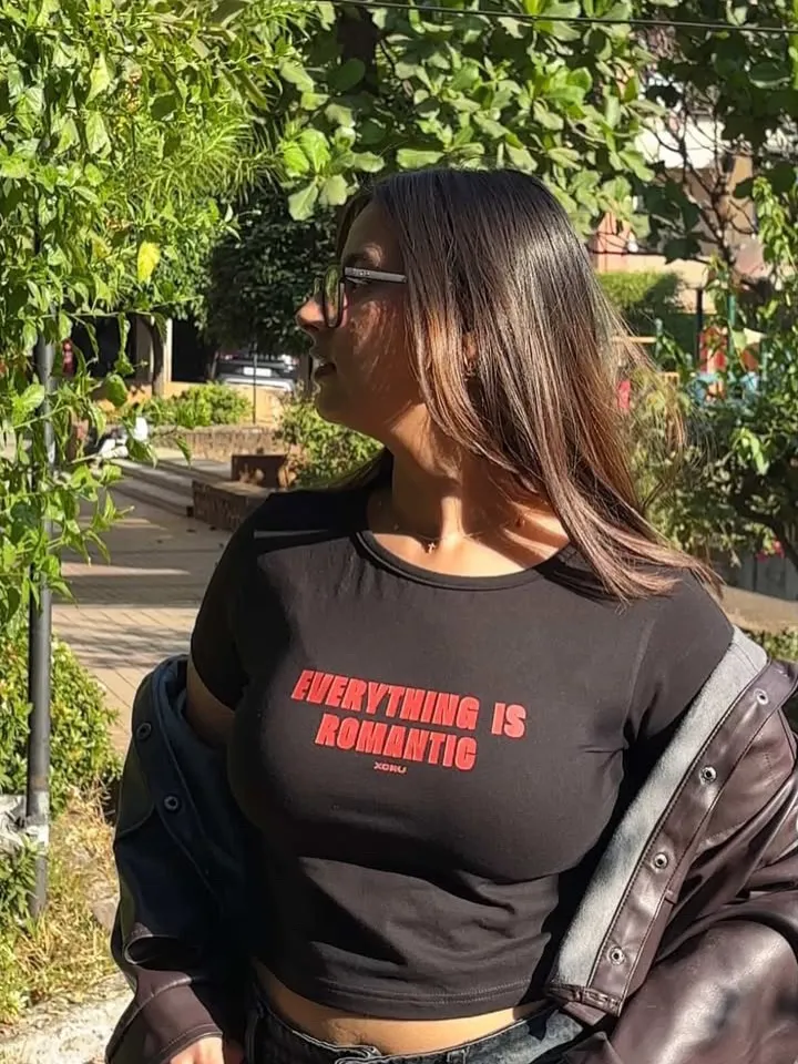 EVERYTHING IS ROMANTIC BABY TEE (XS)